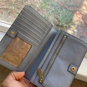 Michael Korda blue wallet. Brand new.